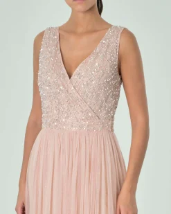 Abito lungo rosa in tulle con corpetto smanicato ricami in perline tono su tono e paillettes argento