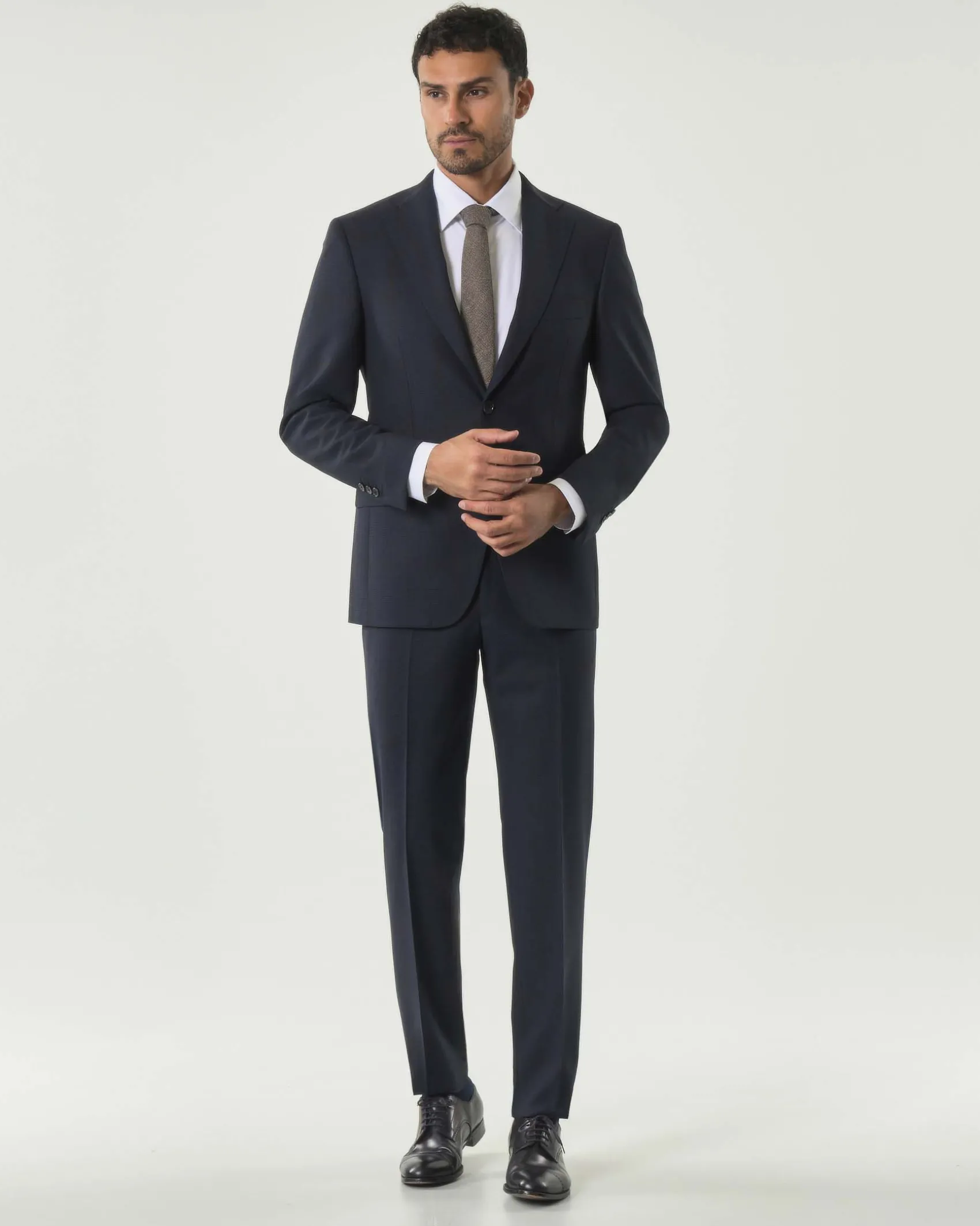 Abito Pellizzari drop7 in tela di lana Vitale Barberis Canonico principe di Galles blu e moro soffuso