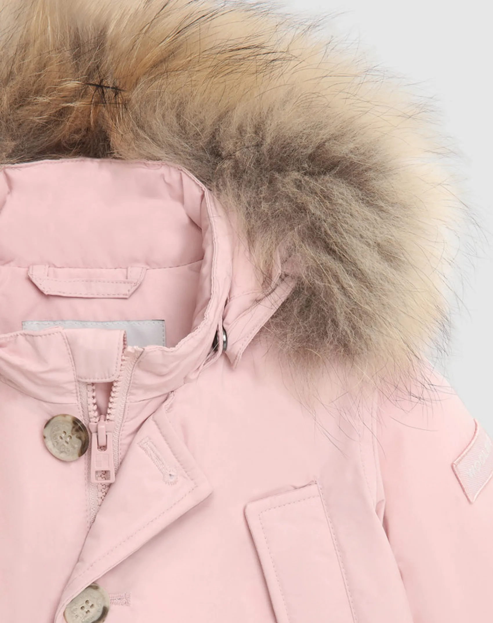 Baby First Parka Woolrich rosa con cappuccio staccabile