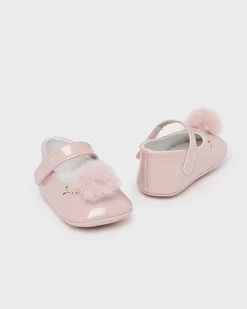 Ballerine in vernice rosa con pompon