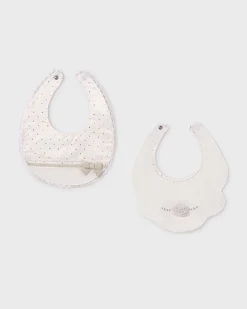Bavaglini beige in cotone a fantasia a pois e fiorellino