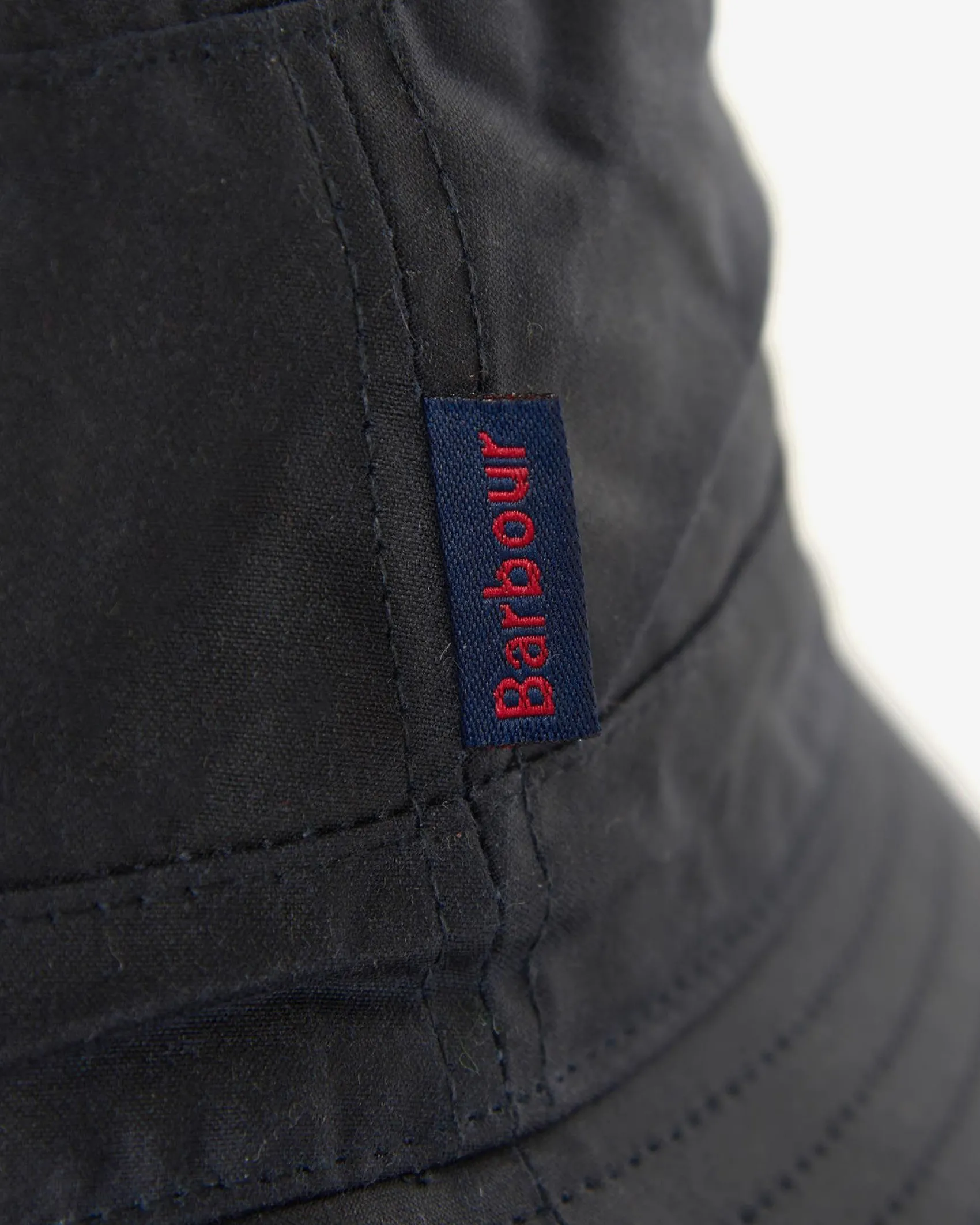 Berretto Barbour blu a pescatore in cotone cerato