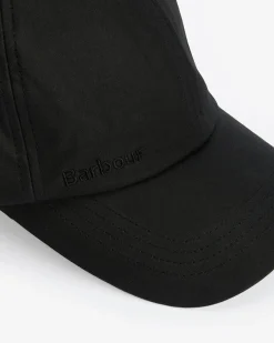 Berretto Barbour nero in cotone cerato con frontino