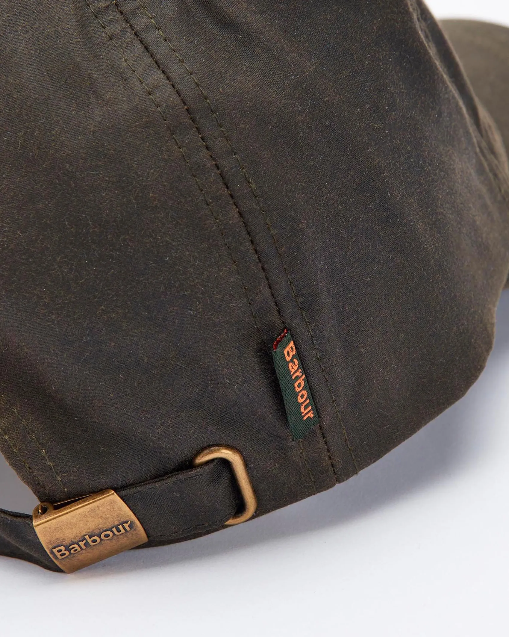 Berretto Barbour verde militare in cotone cerato con frontino