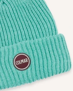 Berretto Colmar Originals color acqua a coste inglesi con logo bollo applicato