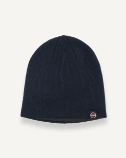 Berretto Colmar Originals blu a cuffia con piccola etichetta porta logo ricamata