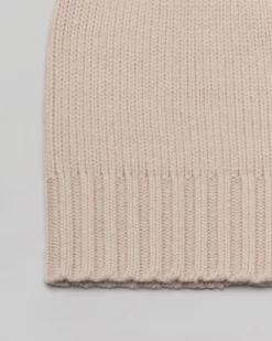 Berretto in cashmere beige con bordatura lavorata a coste