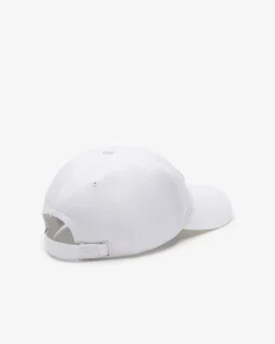 Berretto Lacoste bianco con frontino e maxi coccodrillo verde ricamato