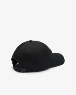 Berretto Lacoste nero con frontino e maxi coccodrillo verde ricamato