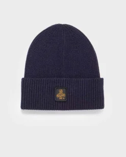 Berretto Refrigiwear blu lavorato a costine con risvolto e patch porta logo
