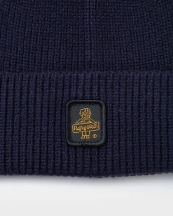 Berretto Refrigiwear blu lavorato a costine con risvolto e patch porta logo