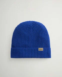 Berretto Woolrich blu royal a coste in lana merino con risvolto e logo