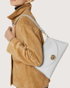 Borsa a mano bordeuax Coccinelle Nikla Small con patta e chiusura a girello con logo