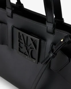Borsa a mano in similpelle nera con maxi fibbia a specchio tono su tono con scritta logo