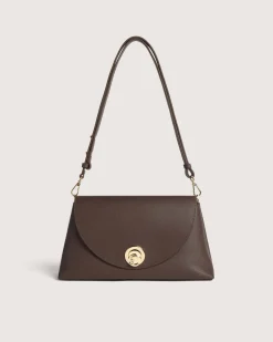 Borsa a mano marrone Coccinelle Nikla Small con patta e chiusura a girello con logo