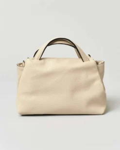 Borsa a mano piccola in pelle morbida effetto martellato color panna con tracolla più lunga rimovibile