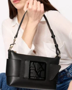 Borsa a spalla nera in similpelle con maxi fibbia logo in metallo in tono