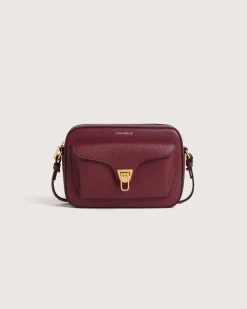 Borsa a tracolla bordeaux Coccinelle Beat Soft Small in pelle con tasca esterna e chiusura a girello