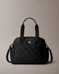 Borsa Calvin Klein nera in tessuto trapuntato con tracolla e fasciatoio portatile