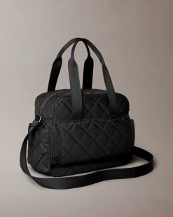 Borsa Calvin Klein nera in tessuto trapuntato con tracolla e fasciatoio portatile
