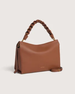 Borsa Coccinelle Boheme Medium in pelle color cognac con manico intrecciato