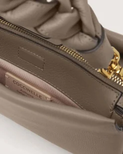 Borsa Coccinelle Boheme Small in pelle color cognac con manico intrecciato