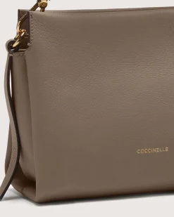 Borsa Coccinelle Boheme Small in pelle color cognac con manico intrecciato