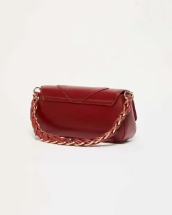 Borsa Emily Marella bordeaux in similpelle liscia a motivo a rilievo a rombi con borchi dorate applicate