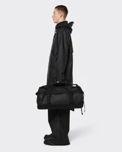 Borsone da viaggio Rains Duffel Bag Small nero in tessuto tecnico impermeabile effetto gommato