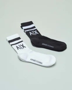 Calzettoni in cotone a coste neri e bianchi con logo jacquard a contrasto
