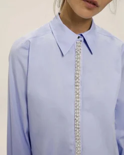 Camicia azzurra Emme Marella in popeline di cotone con strass e perline applicati lungo la chiusura centrale