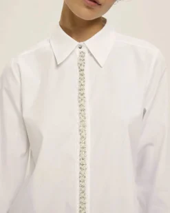 Camicia bianca Emme Marella in popeline di cotone con strass e perline applicati lungo la chiusura centrale
