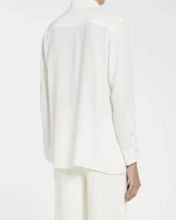 Camicia bianca in crêpe de Chine di misto seta con fusciacca e fiore al collo