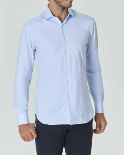 Camicia Xacus azzurra tinta unita in tessuto tecnico active tailor fit