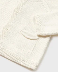 Cardigan avorio in puro cotone con maniche raglan e tasche applicate 4-12 mesi