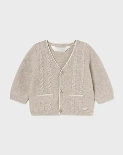 Cardigan beige in misto cotone e lana tricot con trecce