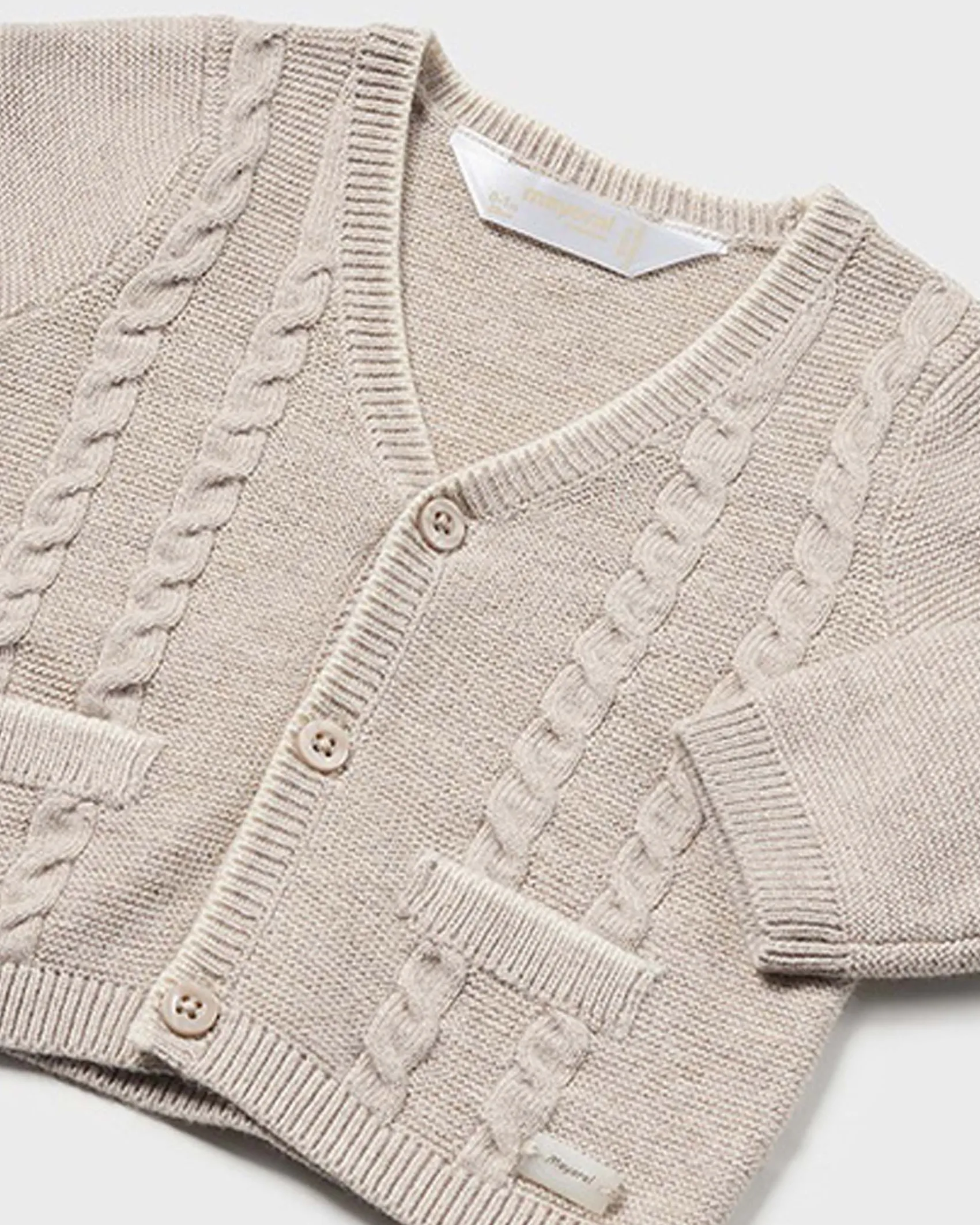Cardigan beige in misto cotone e lana tricot con trecce