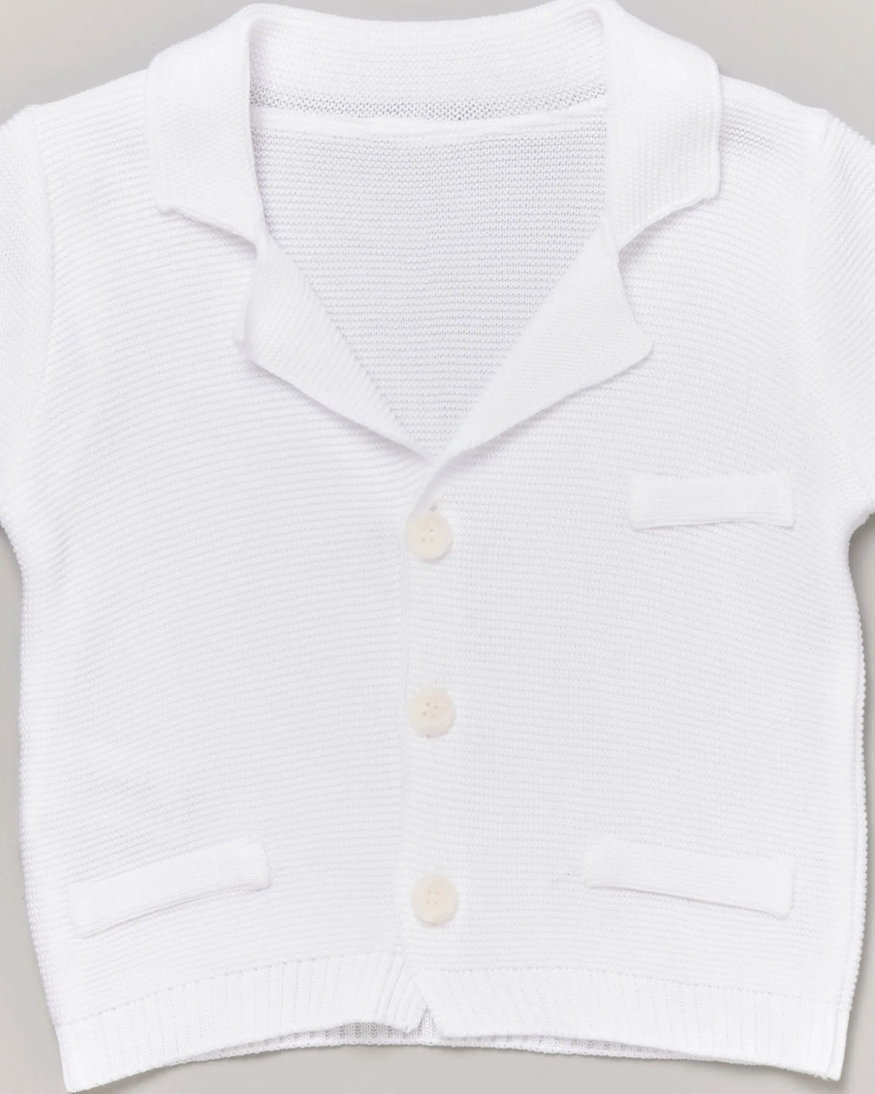 Cardigan bianco in cotone con lavorazione tricot 9-24 mesi