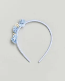 Cerchiello celeste con applicazione floreale