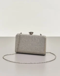 Clutch rigida color grigia in lurex con strass tono su tono applicati sul davanti e chiusura a gioiello a scatto