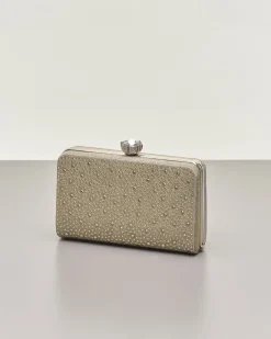 Clutch rigida color oro in lurex con strass tono su tono applicati sul davanti e chiusura a gioiello a scatto