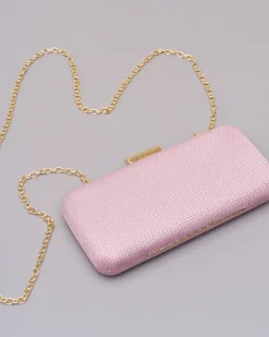 Clutch rigida rosa cipria in tessuto lavorato a micro rete con chiusura a scatto tubolare in metallo dorato