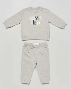 Completo Calvin Klein maglia e pantalone grigi in cotone garzato con logo multicolor