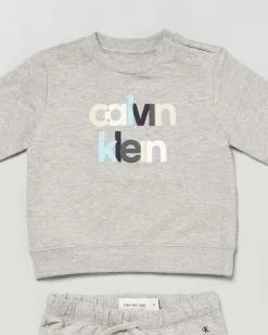 Completo Calvin Klein maglia e pantalone grigi in cotone garzato con logo multicolor