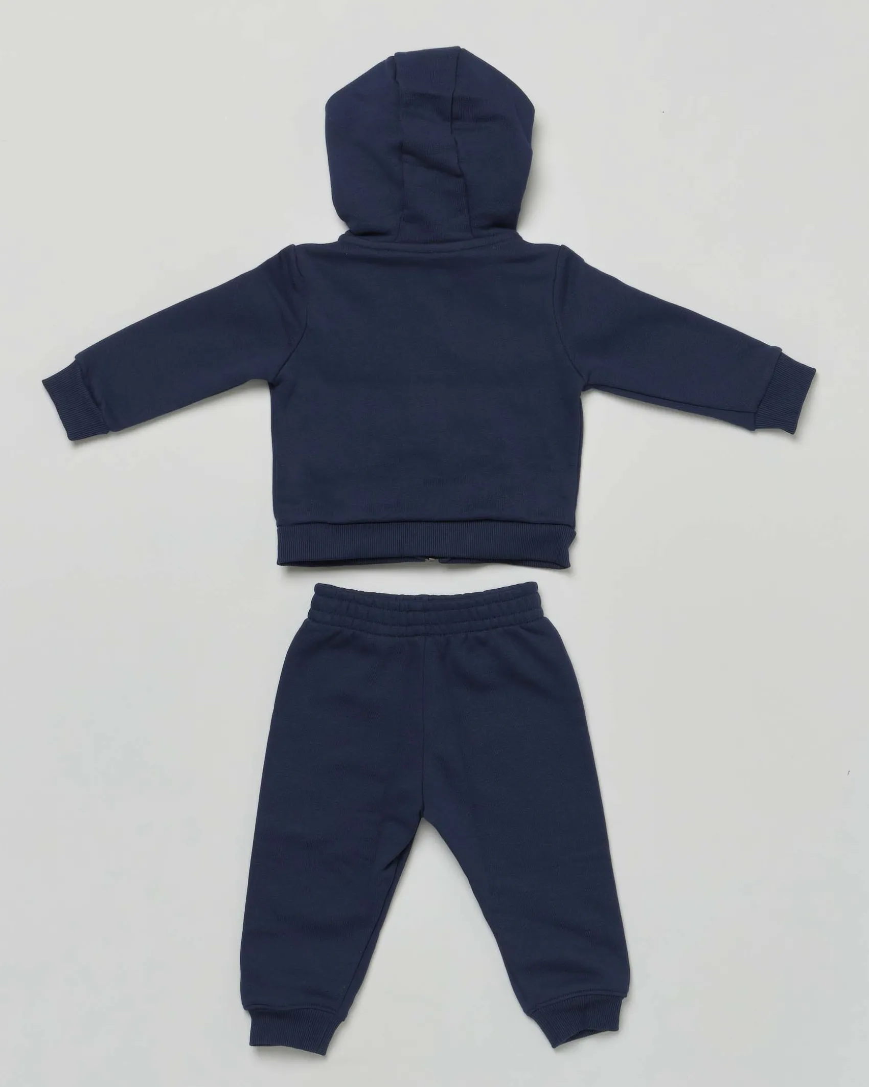 Completo Lacoste felpa e pantalone blu con body bianco