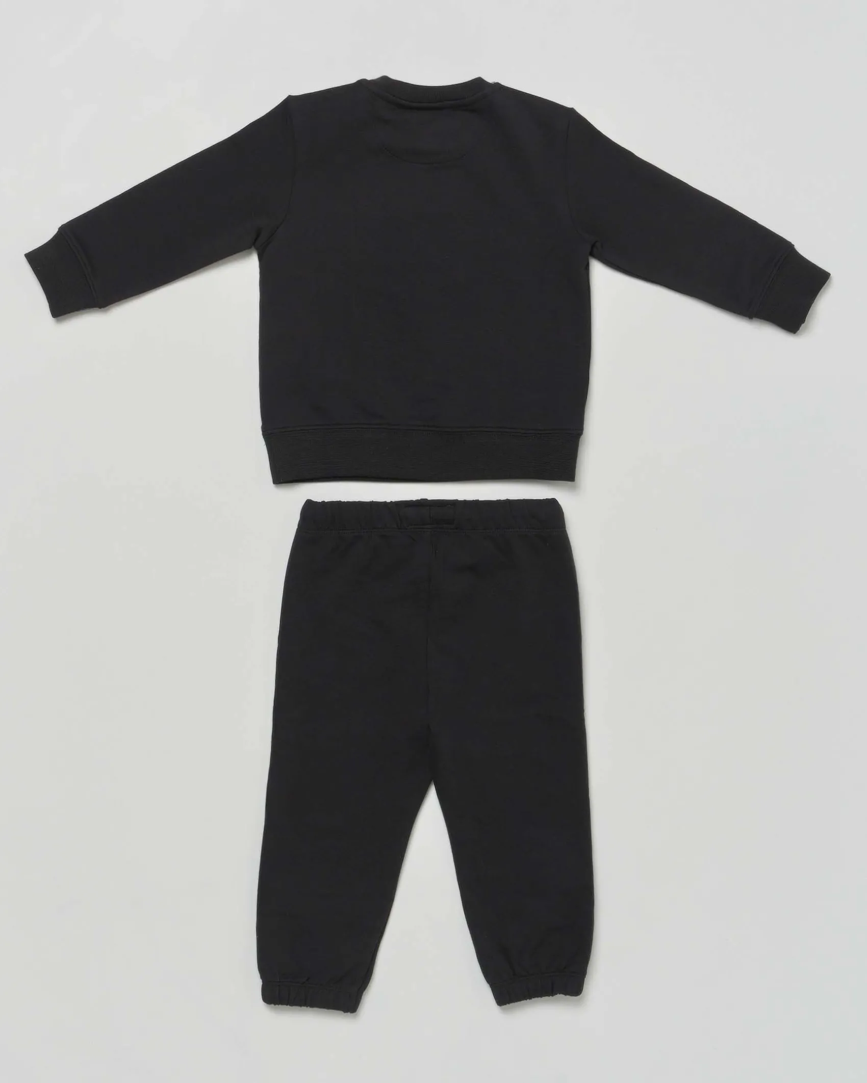 Completo tuta Calvin Klein nera con t-shirt bianca