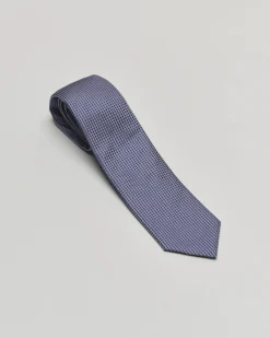 Cravatta blu con micro fantasia in pura seta