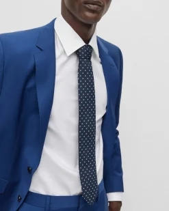 Cravatta blu con micro fantasia azzurra in seta