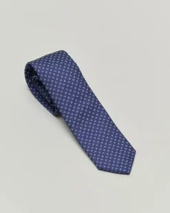 Cravatta blu con micro fantasia cachemire azzurra in pura seta