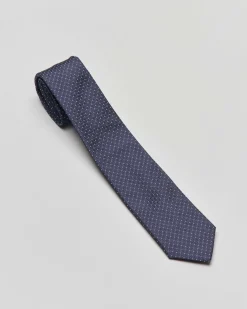 Cravatta blu con micro pois bianchi